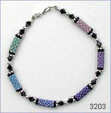 Green-blue-purple bracelet by Robin Atkins, bead artist.