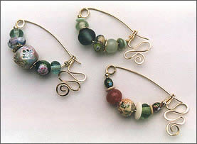 Three Fibula Pins by Robin Atkins, bead artist