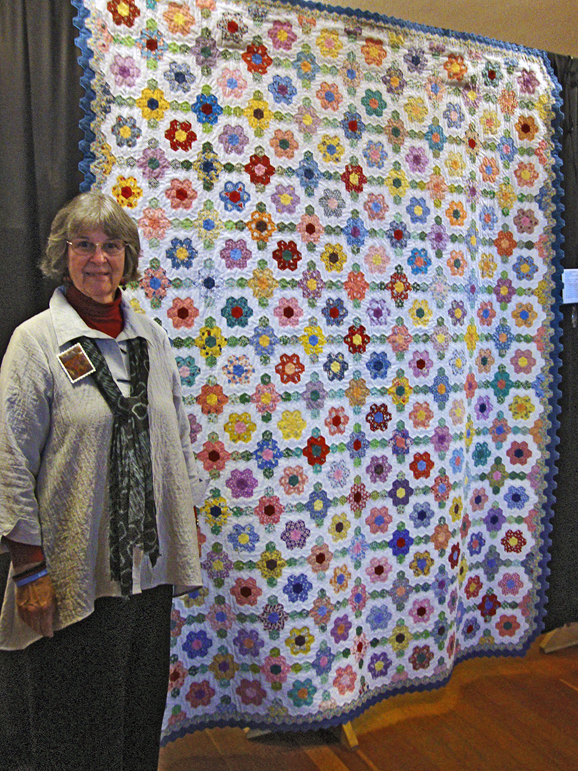 Grandma's Flower Garden, hand-pieced, hand-quilted, traditional hexie quilt by Robin Atkins, bead artist
