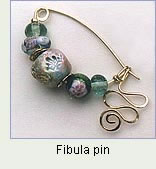 Fibula pin by Robin Atkins, bead artist.