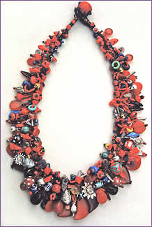 Mostly Red, a woven treasure necklace featuring red trade beads by Robin Atkins, bead artist